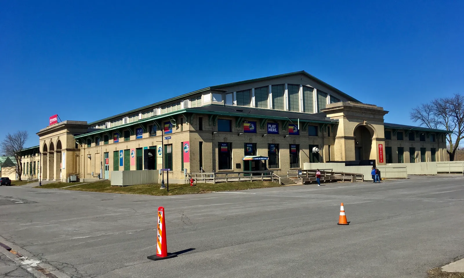The Coliseum at the New York State Fairgrounds, an arena with a tall arched roof, on an empty March day