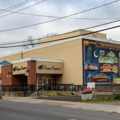 The Players Theatre on State Street, Utica, with the painted mural on its side wall