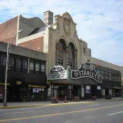 The Stanley Theatre's marquee and terracotta front on Genesee Street, Utica